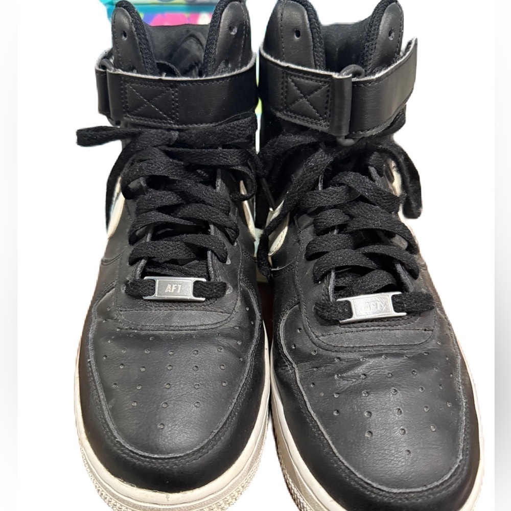 Nike Airforce 1 mid-size 8 black and white high-top sneakers.